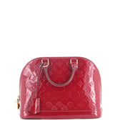 Alma Handbag Monogram Vernis PM