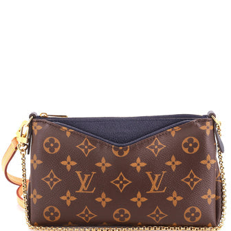 Pallas Clutch Monogram Canvas with Leather