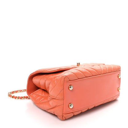 Chanel Aged Calfskin Chevron Quilted Mini Coco Handle Flap Orange