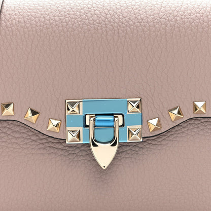 Valentino Garavani Pebbled Calfskin Medium Rockstud Flip Lock Crossbody Bag Poudre