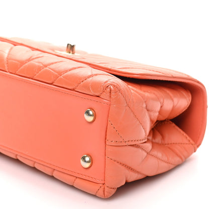 Chanel Aged Calfskin Chevron Quilted Mini Coco Handle Flap Orange