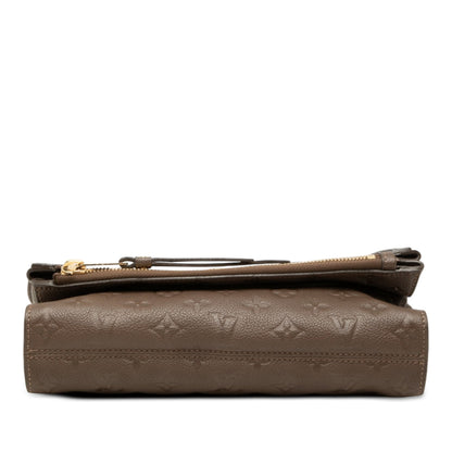 Petillante Clutch Monogram Empreinte Leather
