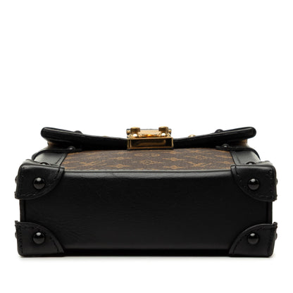 Vertical Trunk Pochette Monogram Canvas