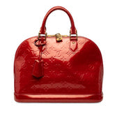 Alma Handbag Monogram Vernis PM