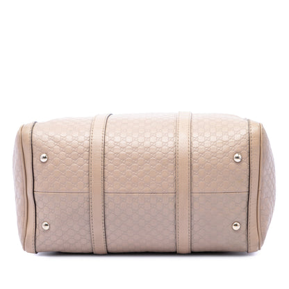 Joy Boston Bag Microguccissima Leather Medium