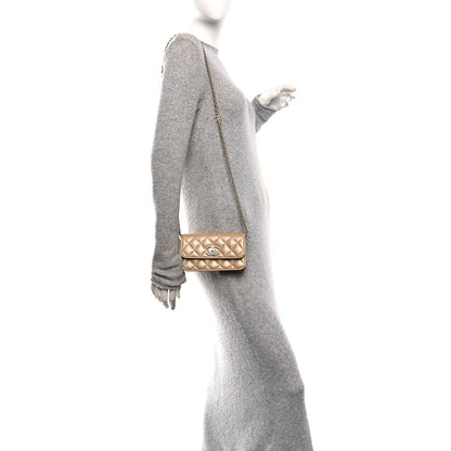 Chanel Iridescent Caviar Camellia Phone Holder With Chain Beige