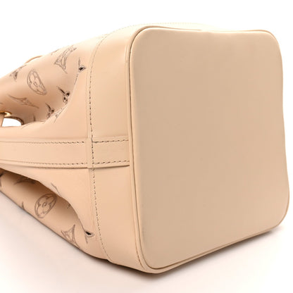 Louis Vuitton Calfskin Monogram Cutout Petit Noe Neutral