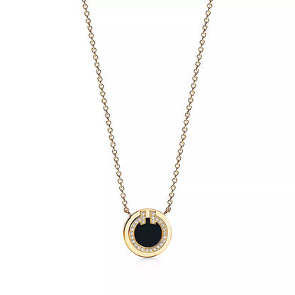 18K Gold Diamond Onyx Tiffany T Pendant