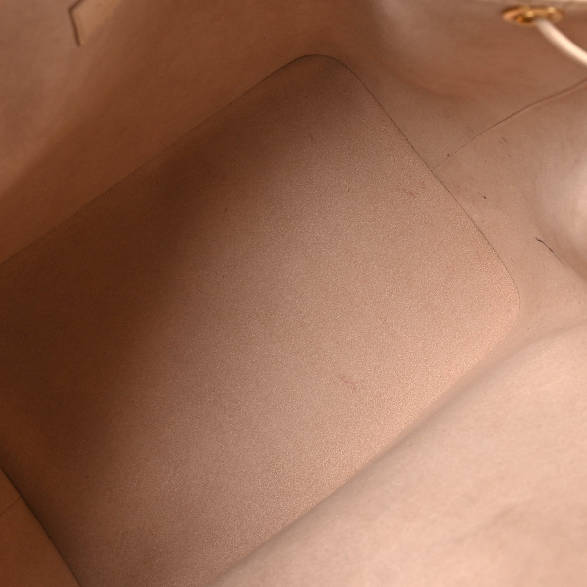 Louis Vuitton Calfskin Monogram Cutout Petit Noe Neutral