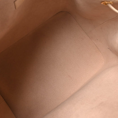 Louis Vuitton Calfskin Monogram Cutout Petit Noe Neutral