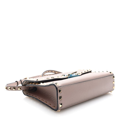 Valentino Garavani Pebbled Calfskin Medium Rockstud Flip Lock Crossbody Bag Poudre