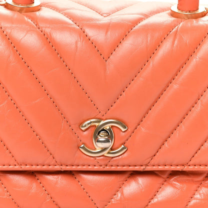 Chanel Aged Calfskin Chevron Quilted Mini Coco Handle Flap Orange