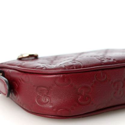 Gucci GG Calfskin Embossed Emblem Mini Shoulder Bag Rosso Ancora
