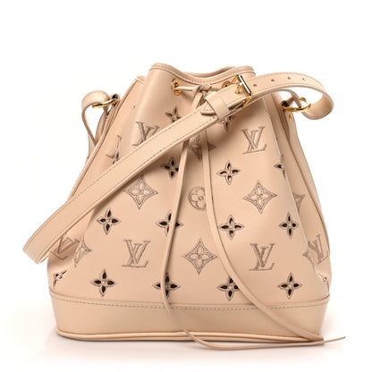 Louis Vuitton Calfskin Monogram Cutout Petit Noe Neutral