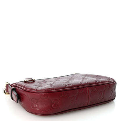 Gucci GG Calfskin Embossed Emblem Mini Shoulder Bag Rosso Ancora